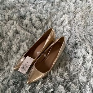 Gold metallic pumps size 9.